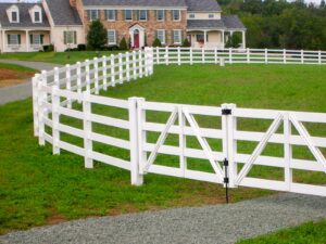 Vinyl Fence with stone house