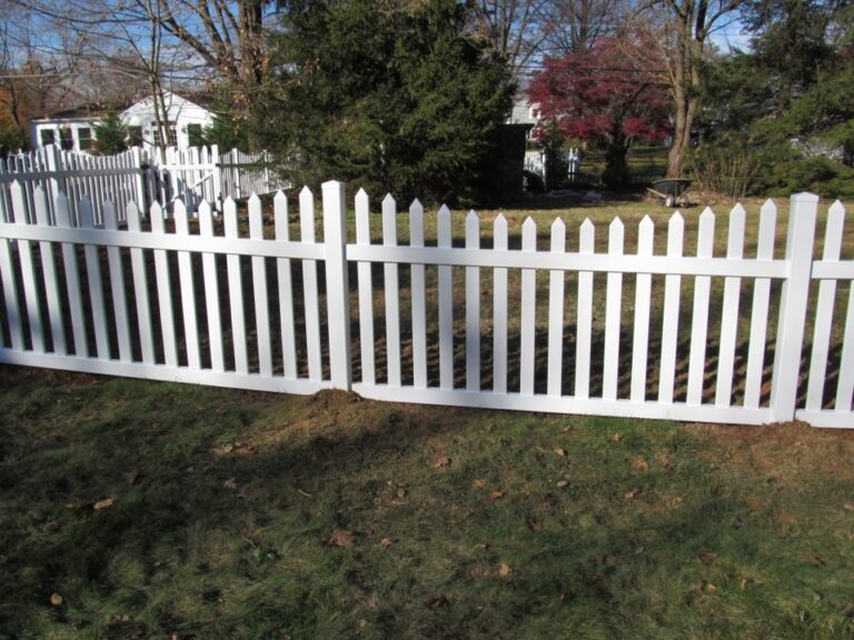 White picket fence with Tree